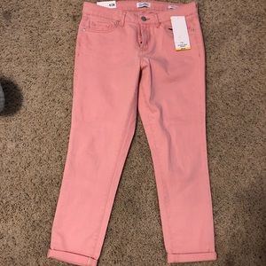 Pink cropped stretchy jeans.